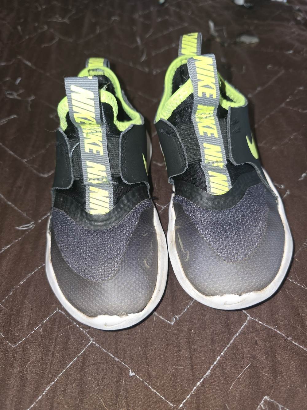 Nike Kids Black Slip-On Sneakers with Neon Yellow Accents